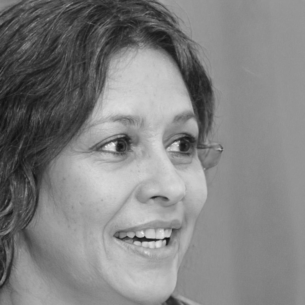 Marjana Vukovic reviewing blockchain training materials